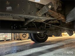Iveco 50C18 Flatbed Truck with Rear-Mounted HMF Crane –