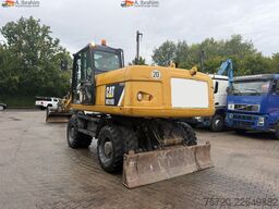 Caterpillar M318D Schnellwechsler Schwenkfunktion OilQuick OQ70 55 Klima Verstellausleger
