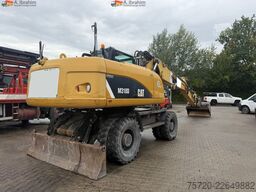 Caterpillar M318D Schnellwechsler Schwenkfunktion OilQuick OQ70 55 Klima Verstellausleger