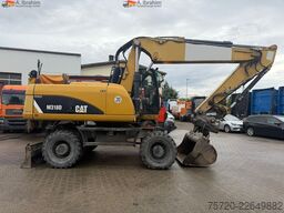 Caterpillar M318D Schnellwechsler Schwenkfunktion OilQuick OQ70 55 Klima Verstellausleger