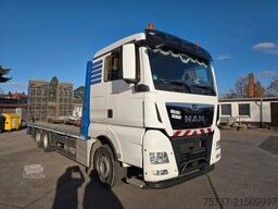 MAN 26.400 TGX mit Baustoffplateau, geteilte Rampen