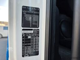 MAN 26.400 TGX mit Baustoffplateau, geteilte Rampen