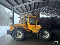 Lundberg 6200LSE wheel loader with snow blower, bucket and
