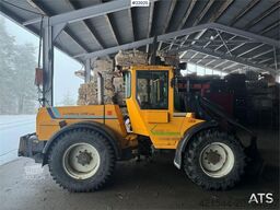 Lundberg 6200LSE wheel loader with snow blower, bucket and