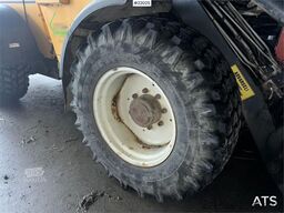 Lundberg 6200LSE wheel loader with snow blower, bucket and