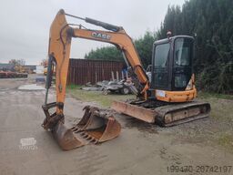 Case CX 50 with 3 excavator buckets