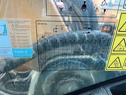 Hyundai HX300 NL with a bucket