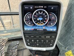 Hyundai HX300 NL with a bucket