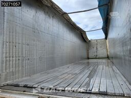Carnehl CSS/AL 3 axles 92m3 Lift Axle Door in headboard