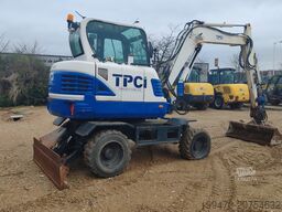 Hyundai R55W-9A with 3 excavator buckets