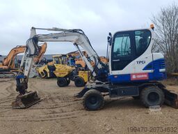Hyundai R55W-9A with 3 excavator buckets