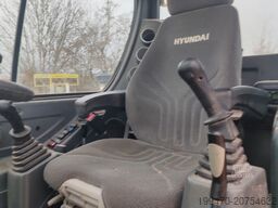 Hyundai R55W-9A with 3 excavator buckets