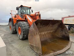 Doosan DL550-5 wheel loader with scale, bucket, and new t