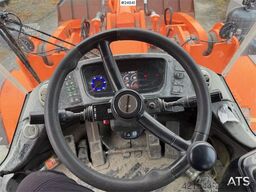 Doosan DL550-5 wheel loader with scale, bucket, and new t