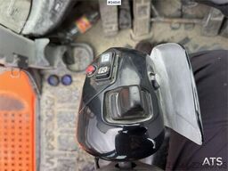 Doosan DL550-5 wheel loader with scale, bucket, and new t