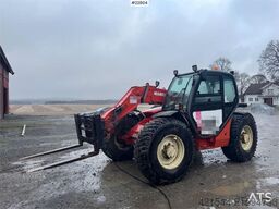 Manitou MLT 633 telehandler with hydraulic pallet forks.