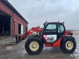 Manitou MLT 633 telehandler with hydraulic pallet forks.