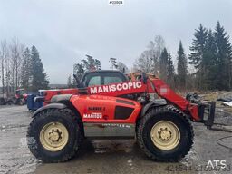 Manitou MLT 633 telehandler with hydraulic pallet forks.