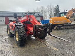 Manitou MLT 633 telehandler with hydraulic pallet forks.