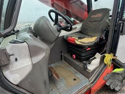 Manitou MLT 633 telehandler with hydraulic pallet forks.