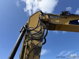 Caterpillar 323FL with tilt and digging bucket
