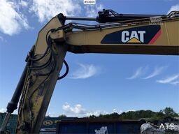 Caterpillar 323FL with tilt and digging bucket