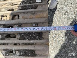 Caterpillar 323FL with tilt and digging bucket