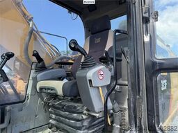 Caterpillar 323FL with tilt and digging bucket