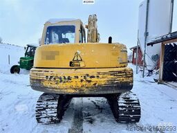 Komatsu PC60-7 crawler excavator with powertilt and 3 buck