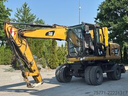 Escavatore pneumatico Caterpillar M313D  KOPARKA KOŁOWA