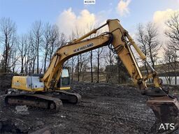 New Holland E265 Excavator with tooth bucket and defective rot