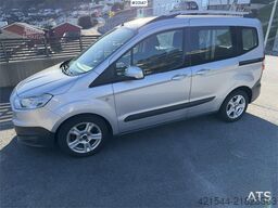 Ford Transit Courier with roof rails, chains, summer/wi