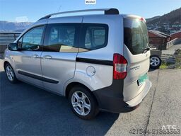 Ford Transit Courier with roof rails, chains, summer/wi