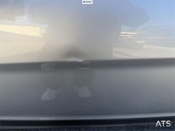 Ford Transit Courier with roof rails, chains, summer/wi