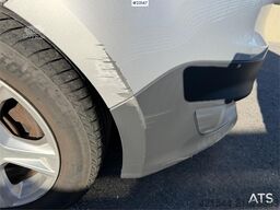 Ford Transit Courier with roof rails, chains, summer/wi
