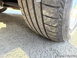 Ford Transit Courier with roof rails, chains, summer/wi