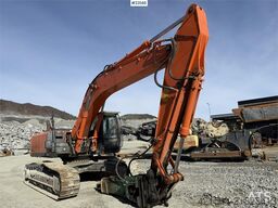 Hitachi ZX290LC-5B excavator with a digging bucket