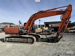 Hitachi ZX290LC-5B excavator with a digging bucket