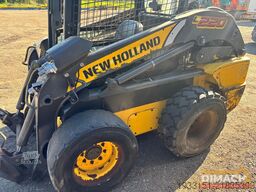 New Holland L220 schranklader - 4x4 - brandschade, motor ok...
