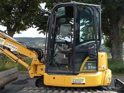 Komatsu PC55MR-5E0 with 3 buckets