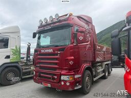 Scania R560 plow-rigged dump truck.