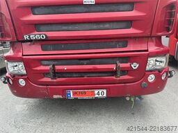 Scania R560 plow-rigged dump truck.