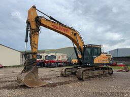 Hyundai HX300 NL with a bucket and ripper