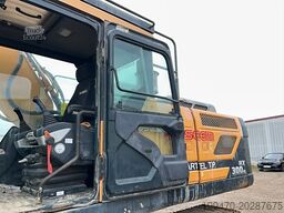 Hyundai HX300 NL with a bucket and ripper