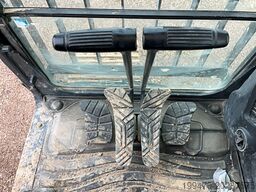 Hyundai HX300 NL with a bucket and ripper