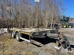 NC machinery trailer with manual loading ramps