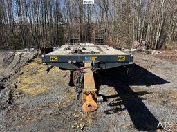 NC machinery trailer with manual loading ramps