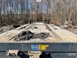 NC machinery trailer with manual loading ramps