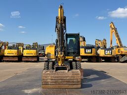 Caterpillar M313D VA - Outriggers + Blade