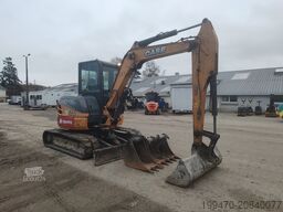 Case CX50B with 3 excavator buckets